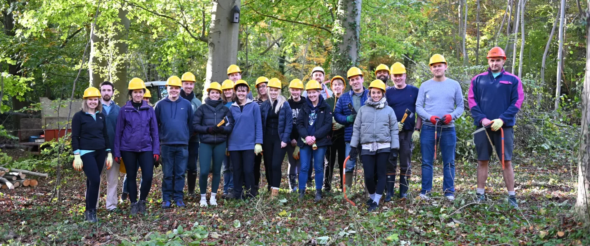 PEM Staff in forest volunteering at Cambridge Past Present and Future