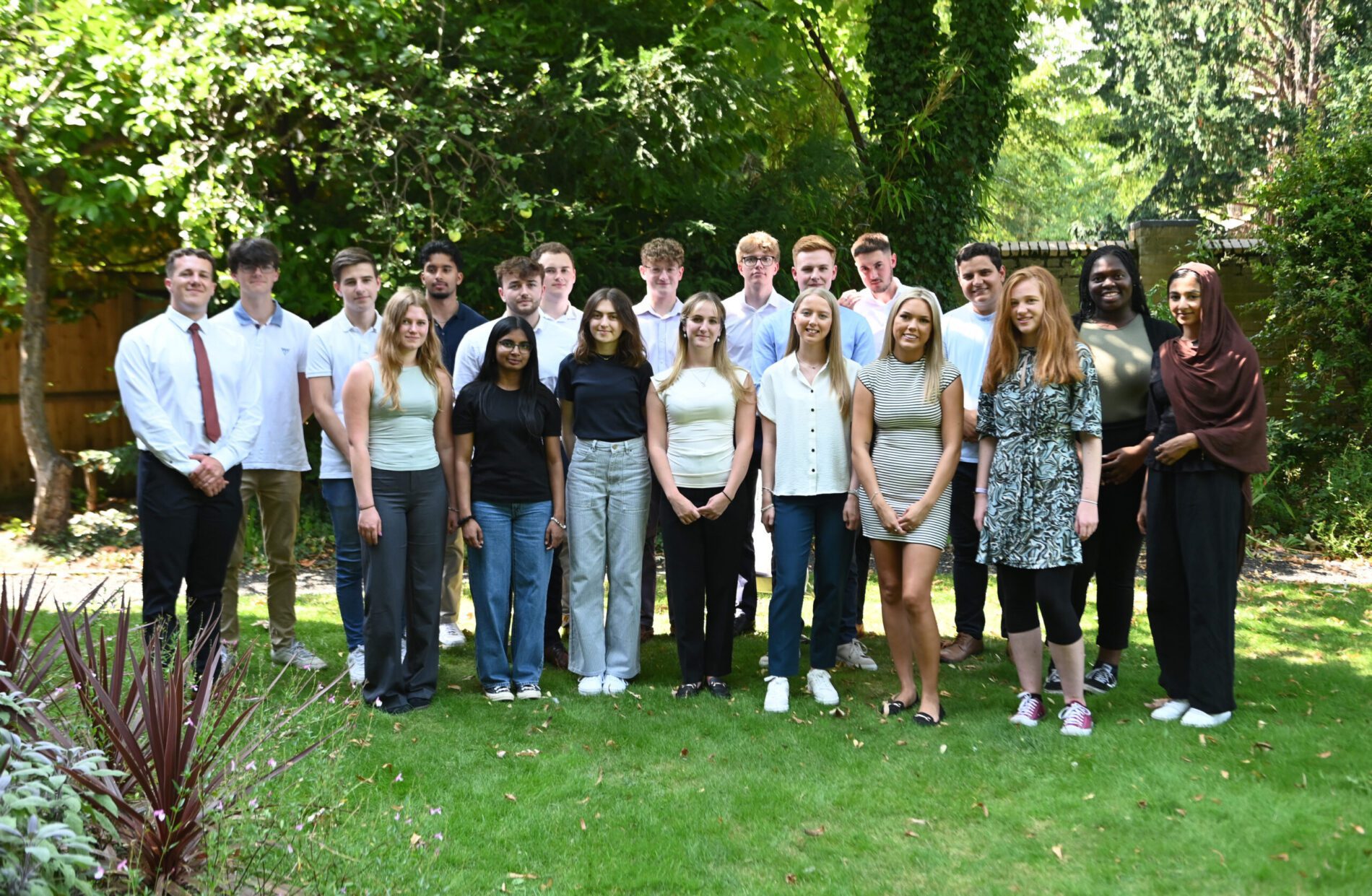 group shot of PEM trainee intake. 21 individuals who will be joining the PEM tax and audit team and training towards their qualifications.