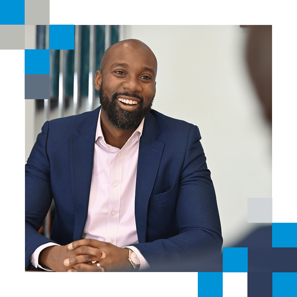 Philip Olagunju discussing business exit with client